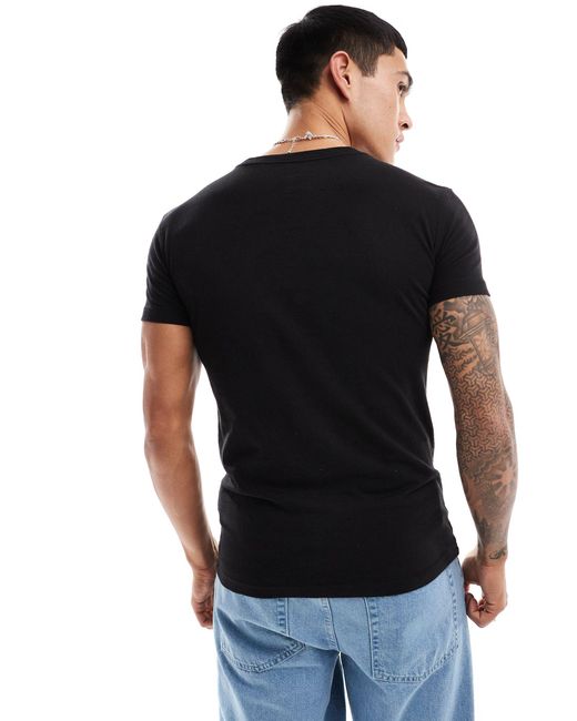 American Eagle – butler – schmal geschnittenes t-shirt mit batikmuster in Black für Herren