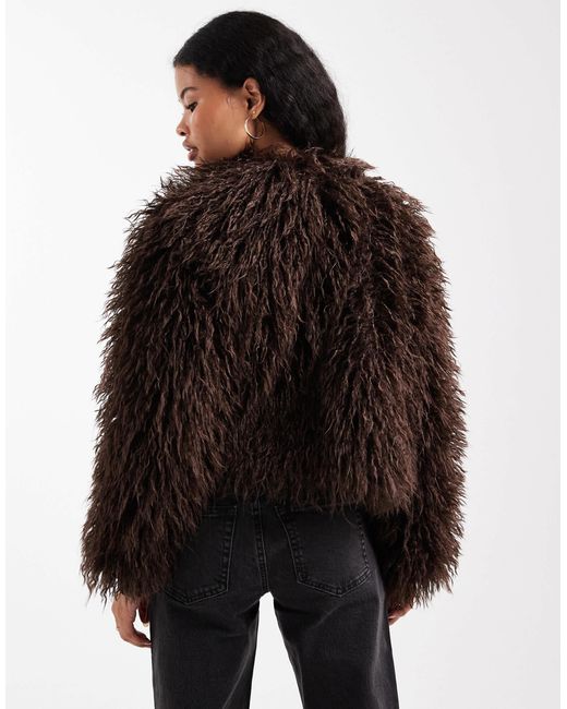 Veste en fausse fourrure à poils longs - marron New Look en coloris Black