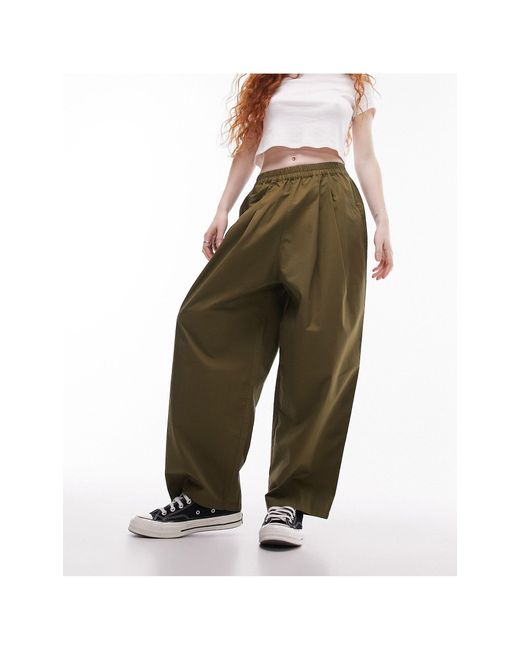 Pantalones s plisados TOPSHOP de color Green