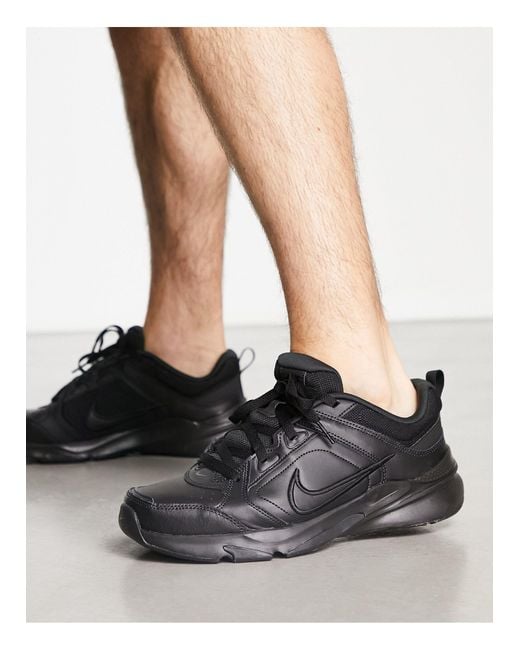 Nike Defy All Day Trainers in Black for Men | Lyst Australia