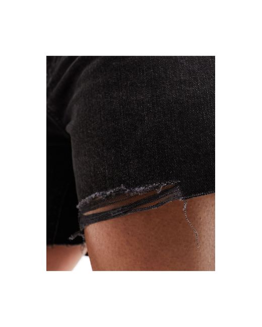 Short en jean coupe dad - délavé ASOS en coloris Black