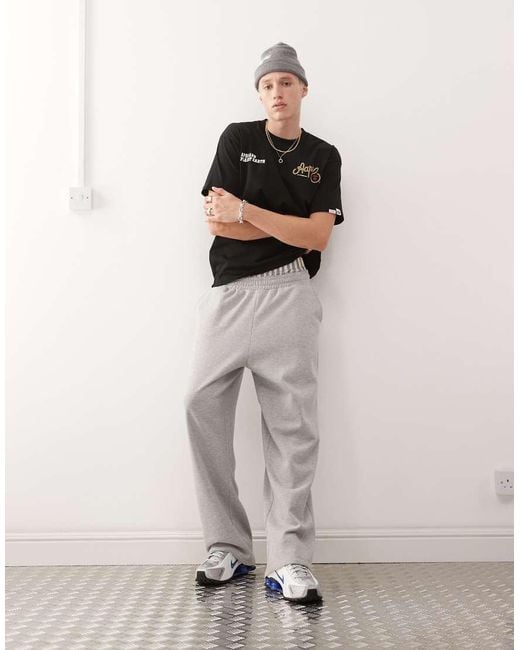 Aape By A Bathing Ape Black Aape By A Bathing Ape Western Logo T-shirt Back Print for men