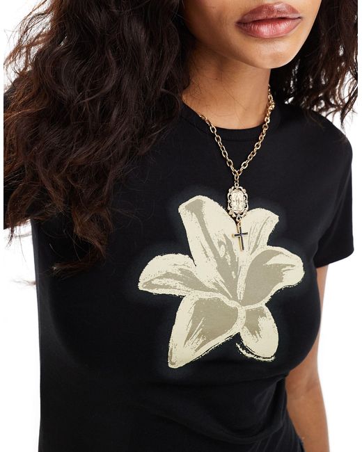 T-shirt délavé à manches courtes et imprimé fleur Reclaimed (vintage) en coloris Black