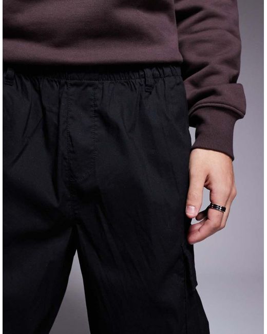 ADPT Black Tapered Balloon Fit Cargo for men
