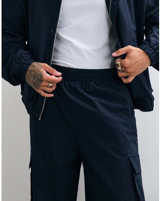 CERNUCCI Blue Textured Nylon Utility Cargo Pants for men
