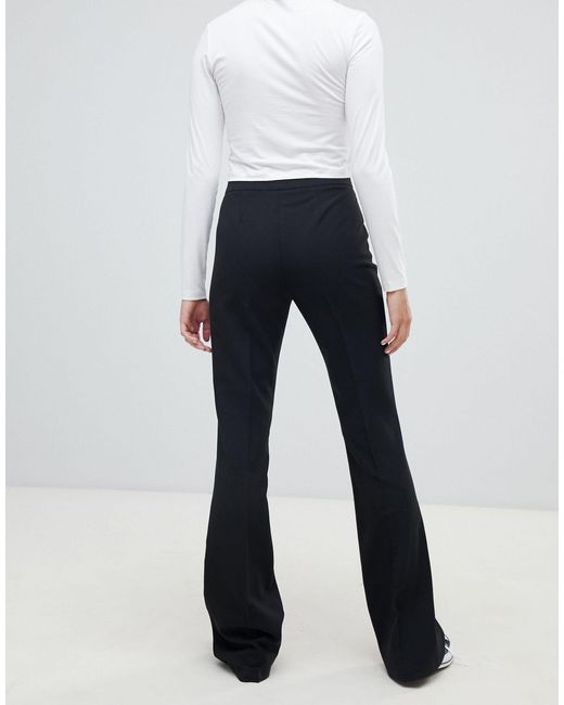 slim kick flare trousers