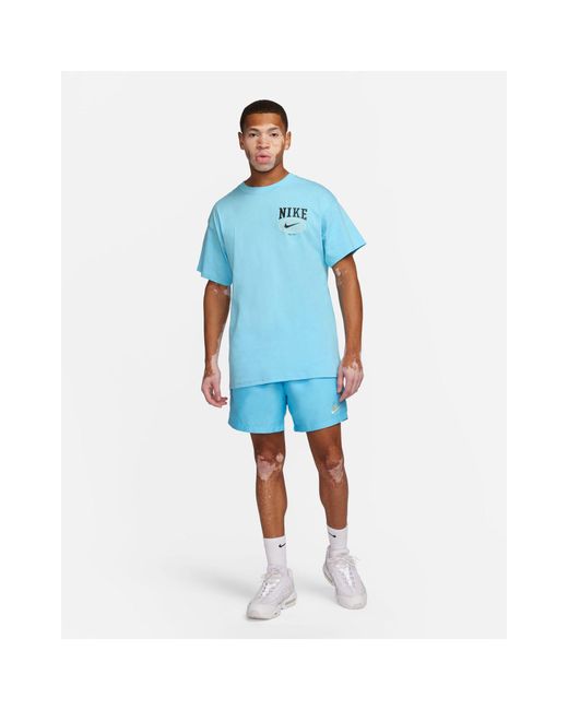 Camiseta azul con estampado gráfico en la espalda y logo swoosh Nike de hombre de color Blue