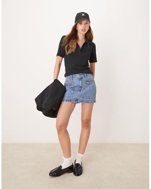 Polo à décolleté en v Abercrombie & Fitch en coloris Black