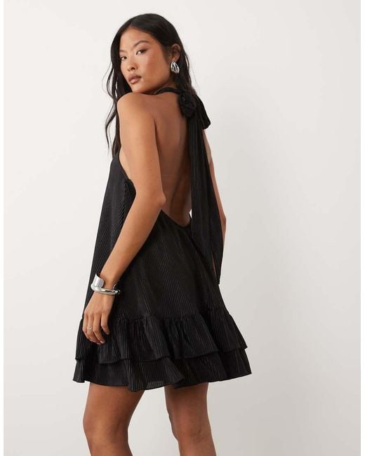 ASOS Black Asos Design Petite Plisse Halter Neck Mini Dress With Ruffle Hem