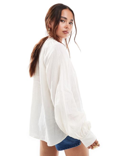 & Other Stories White Textured Ramie Blouse With Volumes Sleeves And Bow Tie Neck Detail