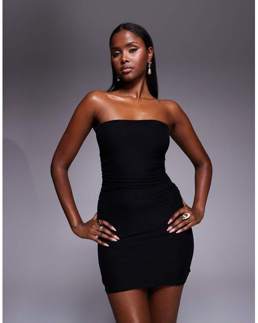 ruched bandeau mini dress in black Black boohoo Petite Ruched Bandeau Mini Dress