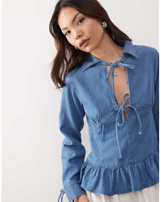 Reclaimed Vintage Blue Long Sleeve Denim Tie Front Top With Peplum Hem
