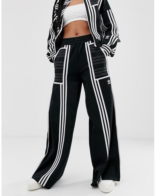 Pantalon de jogging large à rayures mélangées - Noir Adidas Originals en coloris Black
