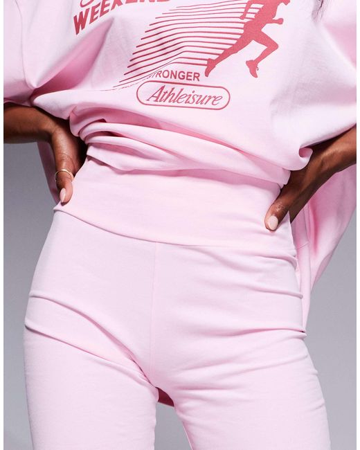 Weekend collective - short legging à imprimé running club ASOS en coloris Red