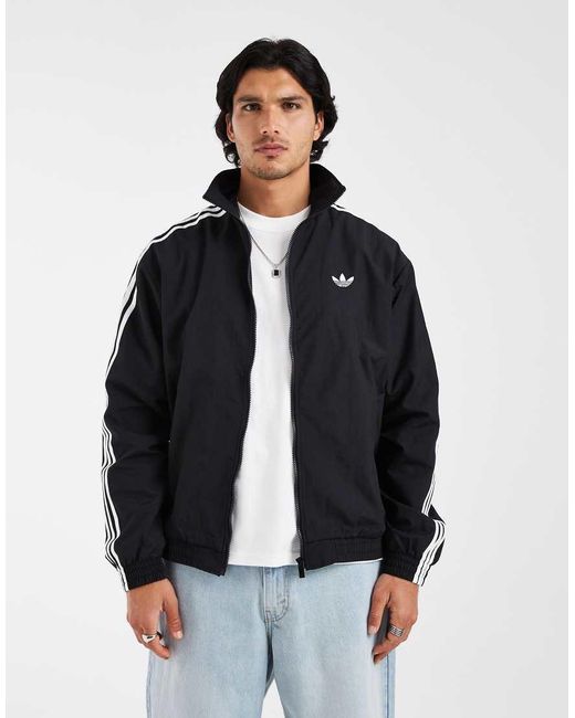 Adidas Originals Black Firebird Woven Track Top for men