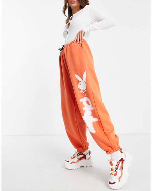 Playboy - joggers oversize di Missguided in Orange