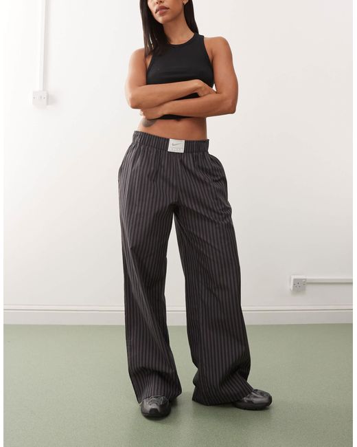 Nike Gray – gestreifte popeline-hose