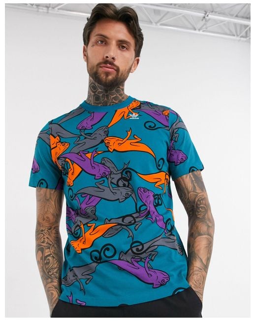 Adidas Originals Blue T-shirt With All Over Chameleon Print for men