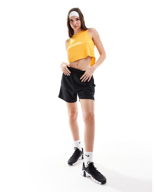 Nike Nike One Training Dri Fit Cropped Tank Top in Yellow Lyst UK