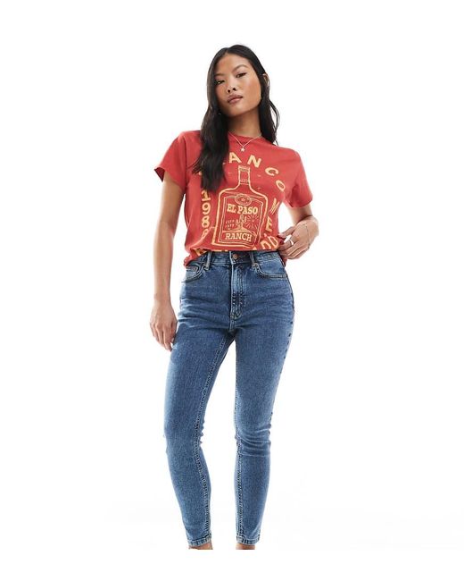 Vaqueros De Corte Pitillo Ultimate De Asos Design Petite ASOS de color Blue