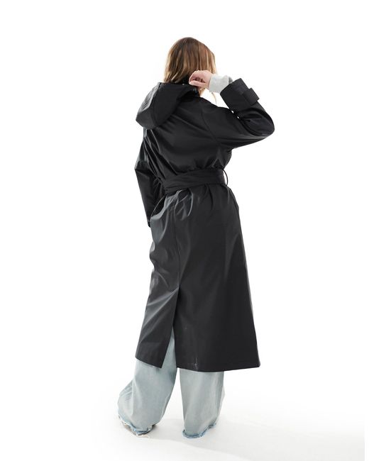 Trench à capuche en caoutchouc imperméable avec ceinture ASOS en coloris Black
