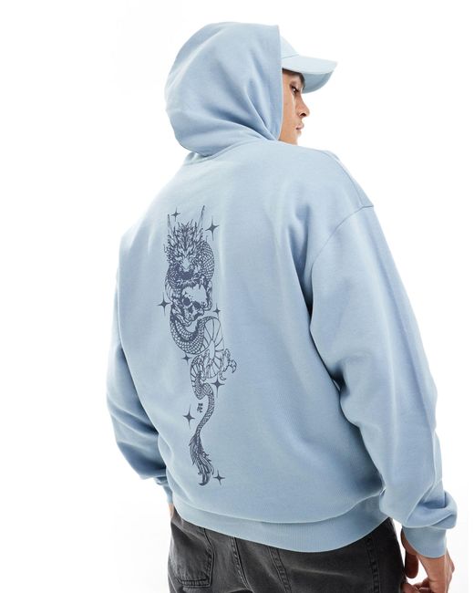 Sweat à capuche oversize avec imprimé verticale au dos ASOS pour homme en coloris Blue