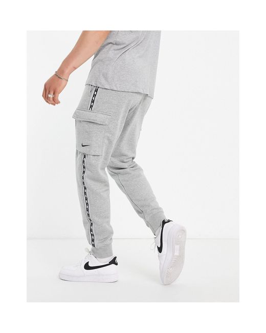Nike Repeat Taping Fleece Cargo Trackies in Grey (Grey) for Men | Lyst  Australia