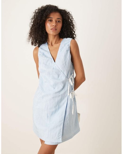 Robe courte à nœuds contrastants Ghospell en coloris Natural