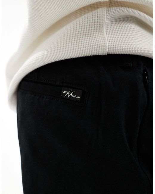 Hollister – sportliche stretch-chinohose in Black für Herren