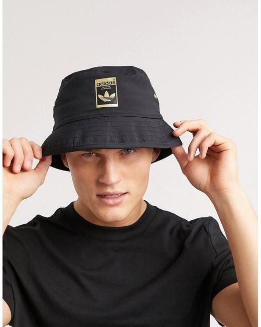 adidas Originals Superstar Bucket Hat With Gold Logo in Black for Men | Lyst