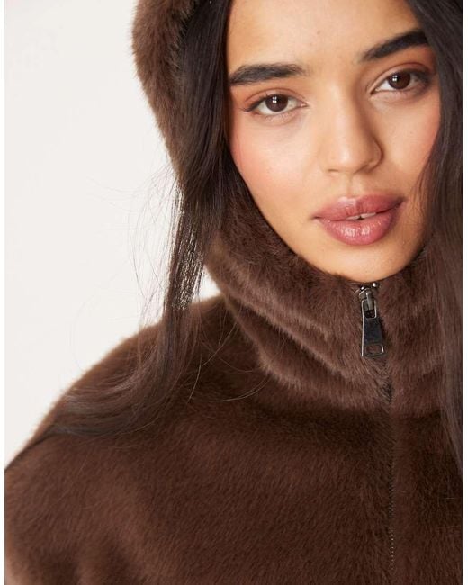 The Frolic Natural Exclusive Faux Fur Zip Through Hooded Bomber Jacket
