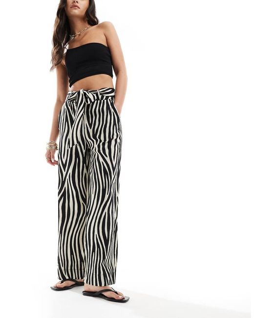 Pantalones Negros De Pernera Recta Con Estampado De Cebra De Mango de color White