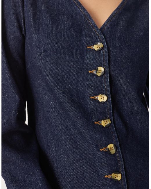 Robe courte en jean à col v et poche - brut ASOS en coloris Blue