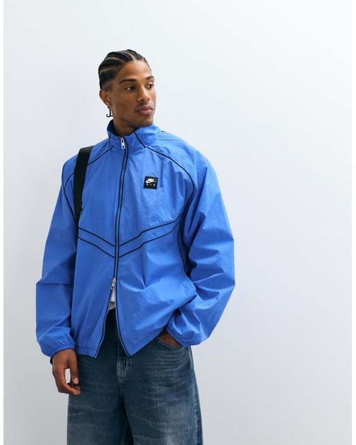 Nike Blue Air Funnel Neck Windrunner Track Jacket for men