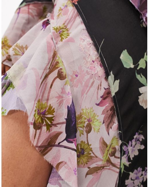 Vestito lungo a maniche lunghe con taglio sbieco a pannelli con stampa mista a fiori di ASOS in Multicolor