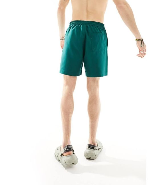Carhartt Blue Chase Swim Shorts for men