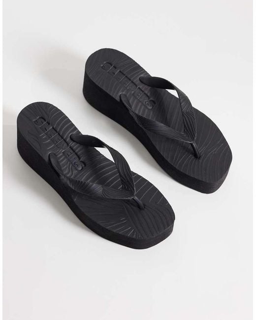 Sleeper Black High Platform Flip Flops