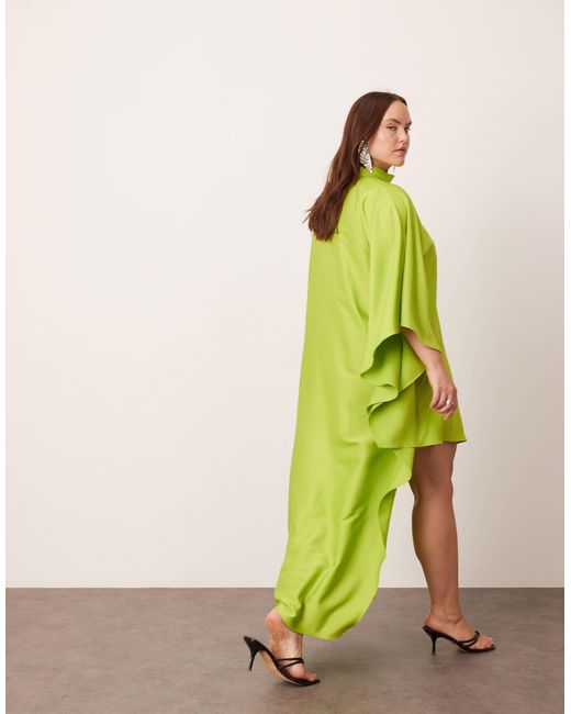 Curve - robe courte à col montant et manches effet cape avec ourlet asymétrique - vert citron ASOS en coloris Green