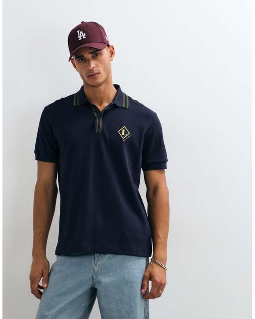 Lacoste Blue Badge Logo Polo Shirt for men