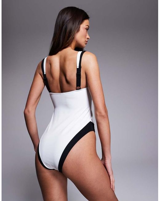 The Frolic White Exclusive Contrast U Bar Detail High Leg Swimsuit