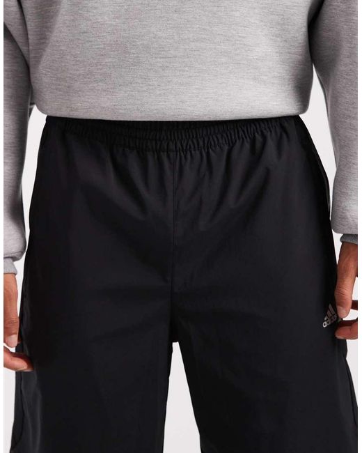 Adidas Originals Black F50 Loose Striped Track Pants for men