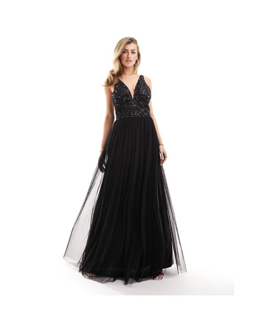 L'invitée - robe longue et ornementée à col en v Beauut en coloris Black