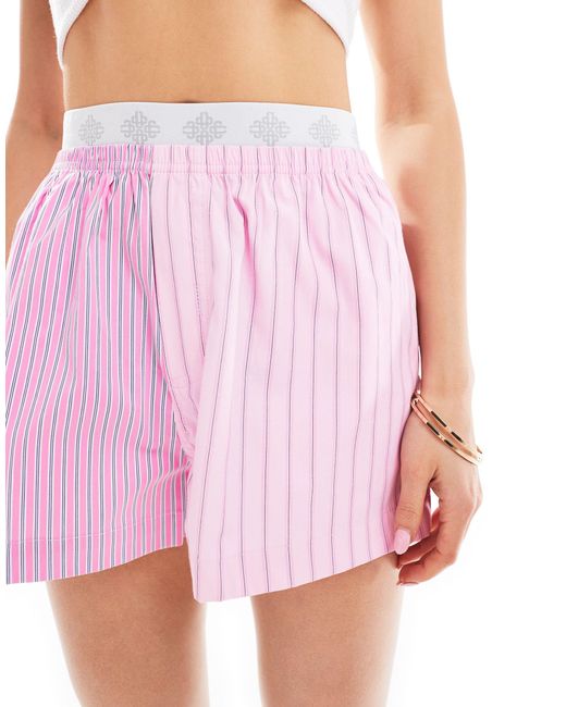 Pantaloncini con design combinato a righe di The Couture Club in Pink