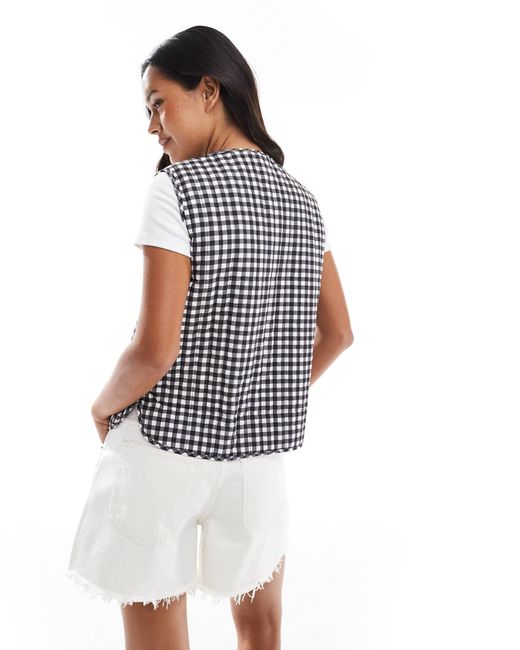 Veste sans manches rembourrée à carreaux vichy New Look en coloris Blue