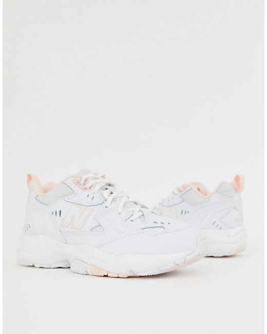608 - Sneakers bianche e rosa con suola spessa di New Balance in White