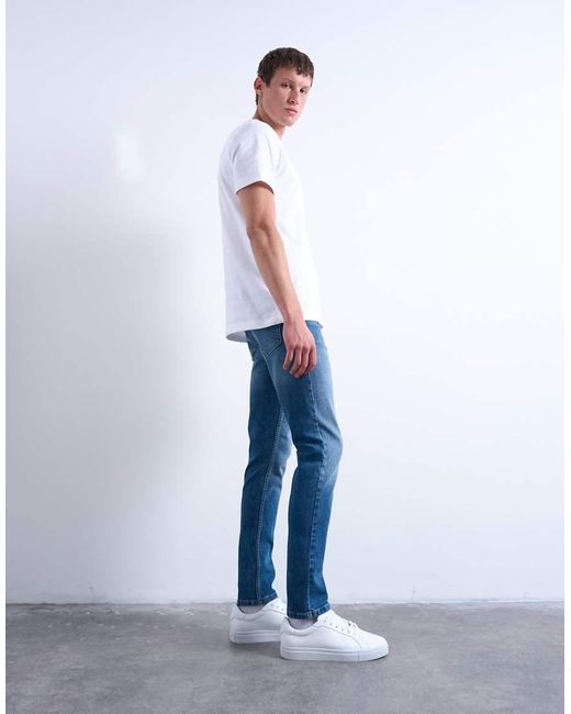 Vaqueros Elásticos De Corte Pitillo Con Lavado Medio De -Azul Topman de hombre de color Blue