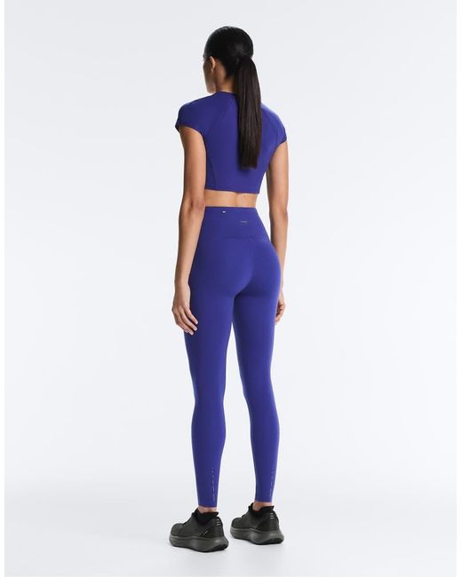 Oysho Blue High Rise Compressive Reflective Ankle-length leggings