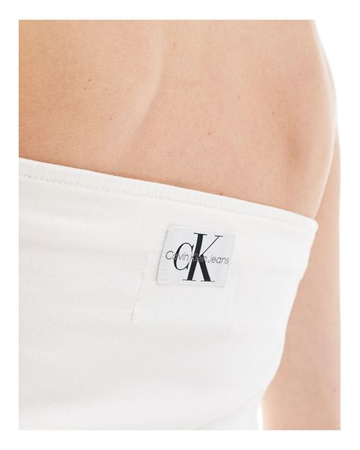 Top vaquero estilo corpiño con lavado y cremallera exclusivo en asos Calvin Klein de color White