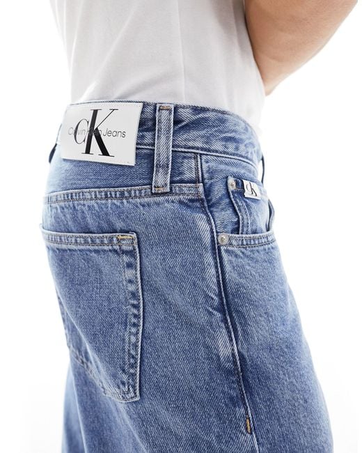 Jeans - jean droit style années 90 - moyen délavé Calvin Klein pour homme en coloris Blue