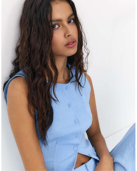 Stradivarius Blue Sleeveless Buttoned Top